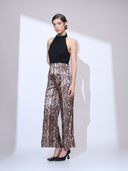 Viper Halter Jumpsuit — black and gold metallic snakeskin wide-leg halter jumpsuit by INHAUTECOUTURE, view 7