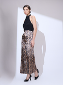 Viper Halter Jumpsuit — black and gold metallic snakeskin wide-leg halter jumpsuit by INHAUTECOUTURE, view 9