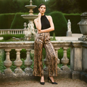 Viper Halter Jumpsuit — black and gold metallic snakeskin wide-leg halter jumpsuit by INHAUTECOUTURE
