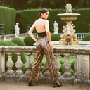 Viper Halter Jumpsuit — black and gold metallic snakeskin wide-leg halter jumpsuit by INHAUTECOUTURE, view 3